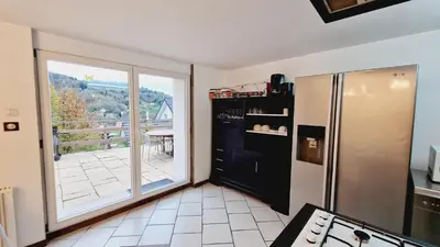 Cuisine ou kitchenette dans l'établissement Gitedaval La Revauche et spa