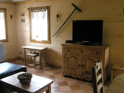 Télévision ou salle de divertissement dans l'établissement Chalet Biazot