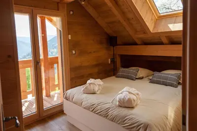 Un ou plusieurs lits dans un hébergement de l'établissement La Cabane de Tim