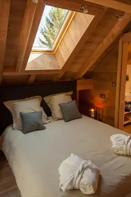 Un ou plusieurs lits dans un hébergement de l'établissement La Cabane de Tim