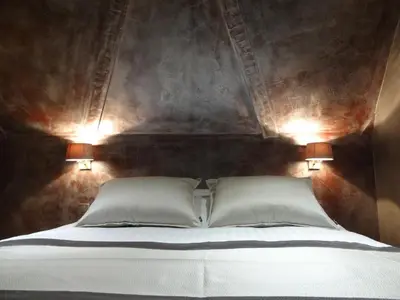Un ou plusieurs lits dans un hébergement de l'établissement Le 1615 - Luxe et Spa