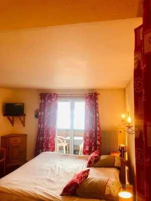 Un ou plusieurs lits dans un hébergement de l'établissement L'Auberge au Bord du Lac
