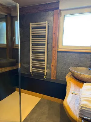 Un ou plusieurs lits dans un hébergement de l'établissement L'Auberge au Bord du Lac