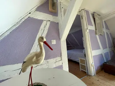 Un ou plusieurs lits dans un hébergement de l'établissement Gîte Aux P'tits Cœurs d'Alsace