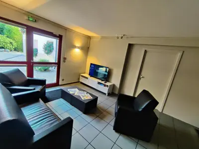 Télévision ou salle de divertissement dans l'établissement La Clef des Champs - Proche Colmar