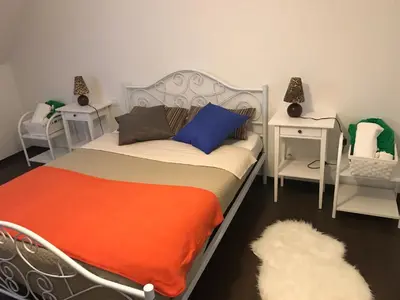 Un ou plusieurs lits dans un hébergement de l'établissement Appartement avec garage Colmar Centre Historique