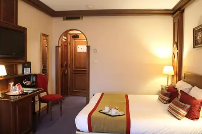 Un ou plusieurs lits dans un hébergement de l'établissement Hotel Le Mandelberg