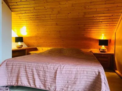 Un ou plusieurs lits dans un hébergement de l'établissement Chalet Sapin