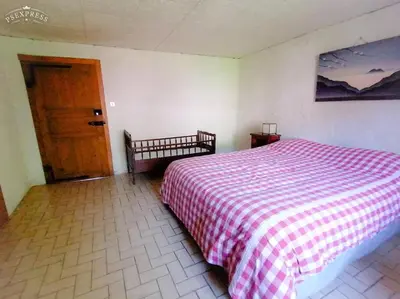 Un ou plusieurs lits dans un hébergement de l'établissement Ferme de ma Grand-Mère