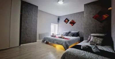 Un ou plusieurs lits dans un hébergement de l'établissement Gitedaval Hangy bas & spa