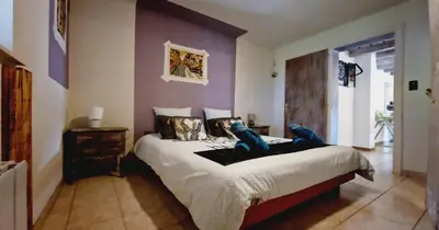 Un ou plusieurs lits dans un hébergement de l'établissement Gitedaval Hangy bas & spa