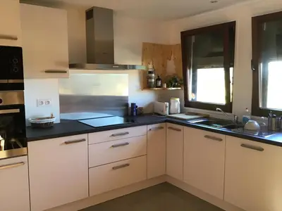 Cuisine ou kitchenette dans l'établissement Duplex Bellevue