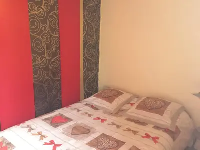 Un ou plusieurs lits dans un hébergement de l'établissement Appartement vue sur lac