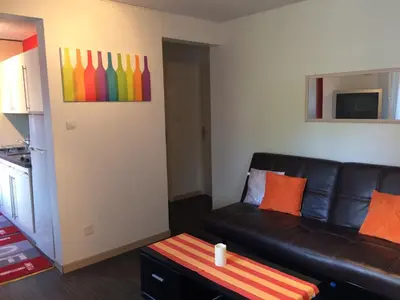 Coin salon dans l'établissement Appartement vue sur lac