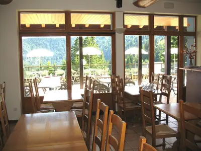 Restaurant ou autre lieu de restauration dans l'établissement Les Terrasses du Lac Blanc - Studios & Appartements