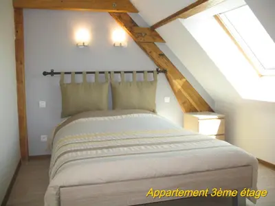 Un ou plusieurs lits dans un hébergement de l'établissement Les Terrasses du Lac Blanc - Studios & Appartements