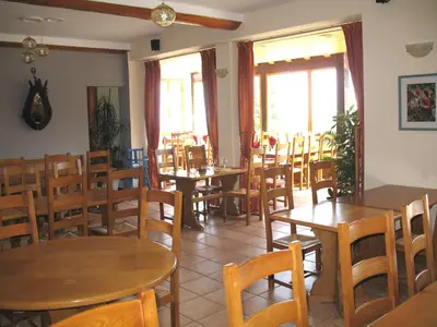 Restaurant ou autre lieu de restauration dans l'établissement Les Terrasses du Lac Blanc - Studios & Appartements
