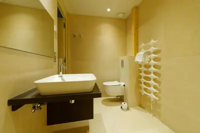 Salle de bains dans l'établissement The One Apartments