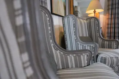 Coin salon dans l'établissement Auberge De La Poulcière