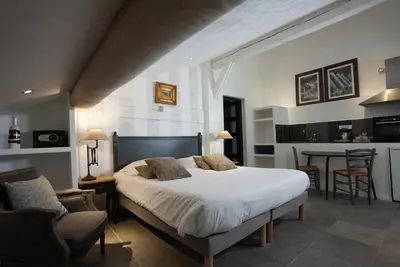 Un ou plusieurs lits dans un hébergement de l'établissement Auberge De La Poulcière