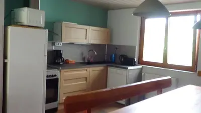 Cuisine ou kitchenette dans l'établissement Gite Rammelstein