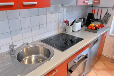 Cuisine ou kitchenette dans l'établissement Appartement L'Elégant de la Petite Venise