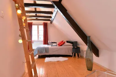 Un ou plusieurs lits dans un hébergement de l'établissement Appartement L'Elégant de la Petite Venise