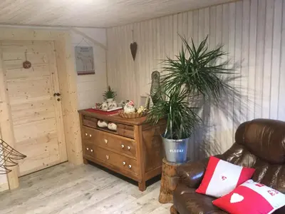 Coin salon dans l'établissement La Ferme de Là-haut B&B