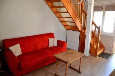 Coin salon dans l'établissement Les Loges de l'Ecomusée D'Alsace
