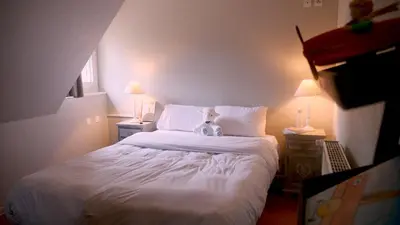 Un ou plusieurs lits dans un hébergement de l'établissement Les Loges de l'Ecomusée D'Alsace