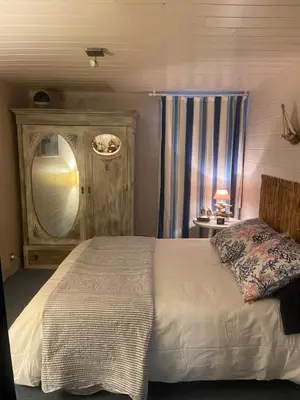 Un ou plusieurs lits dans un hébergement de l'établissement GÎTE AVEC PISCINE CHEZ Véro