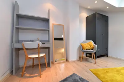 Coin salon dans l'établissement Appartement La Terrasse sur cour