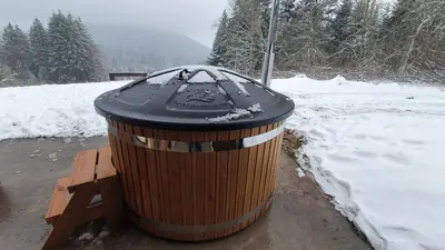 L'établissement LE CHALET VOSGIEN bain nordique Kota Grill en hiver