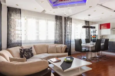 Coin salon dans l'établissement Appartement La Bagatelle