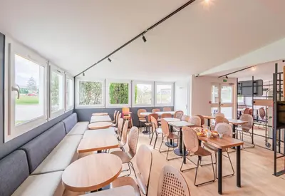 Coin salon dans l'établissement B&B HOTEL Mulhouse Sausheim