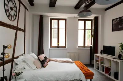 Un ou plusieurs lits dans un hébergement de l'établissement Gite See You Soon - Le Loft