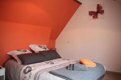 Un ou plusieurs lits dans un hébergement de l'établissement Maison de Tante Louise
