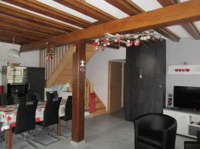 Télévision ou salle de divertissement dans l'établissement Maison de Tante Louise