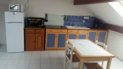 Cuisine ou kitchenette dans l'établissement La familia
