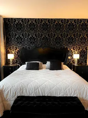 Un ou plusieurs lits dans un hébergement de l'établissement Hôtel La Réserve