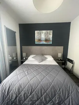 Un ou plusieurs lits dans un hébergement de l'établissement Hôtel La Réserve