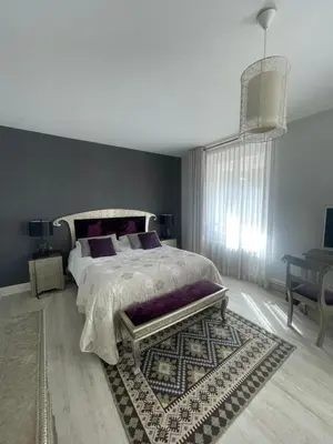 Un ou plusieurs lits dans un hébergement de l'établissement Hôtel La Réserve