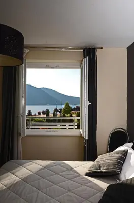 Un ou plusieurs lits dans un hébergement de l'établissement Hôtel La Réserve