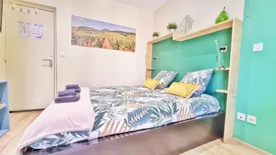 Un ou plusieurs lits dans un hébergement de l'établissement Splendide Studio Centre Colmar