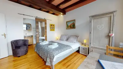 Un ou plusieurs lits dans un hébergement de l'établissement Le Clos bartholdi