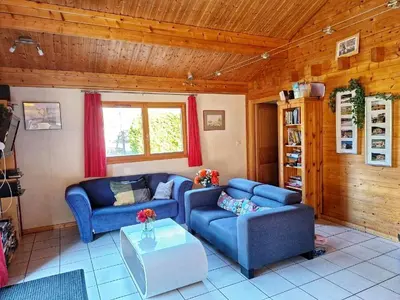 Coin salon dans l'établissement Chalet Notre Retraite
