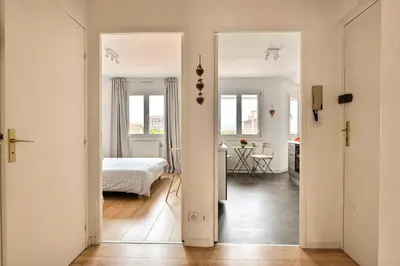 Un ou plusieurs lits dans un hébergement de l'établissement Le petit nid de Max et Sophie 1free garage
