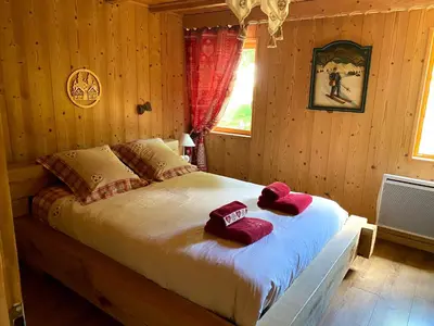 Un ou plusieurs lits dans un hébergement de l'établissement Chalet d' Annelise