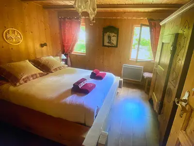 Un ou plusieurs lits dans un hébergement de l'établissement Chalet d' Annelise