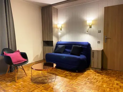 Coin salon dans l'établissement Laterale Residences Riquewihr